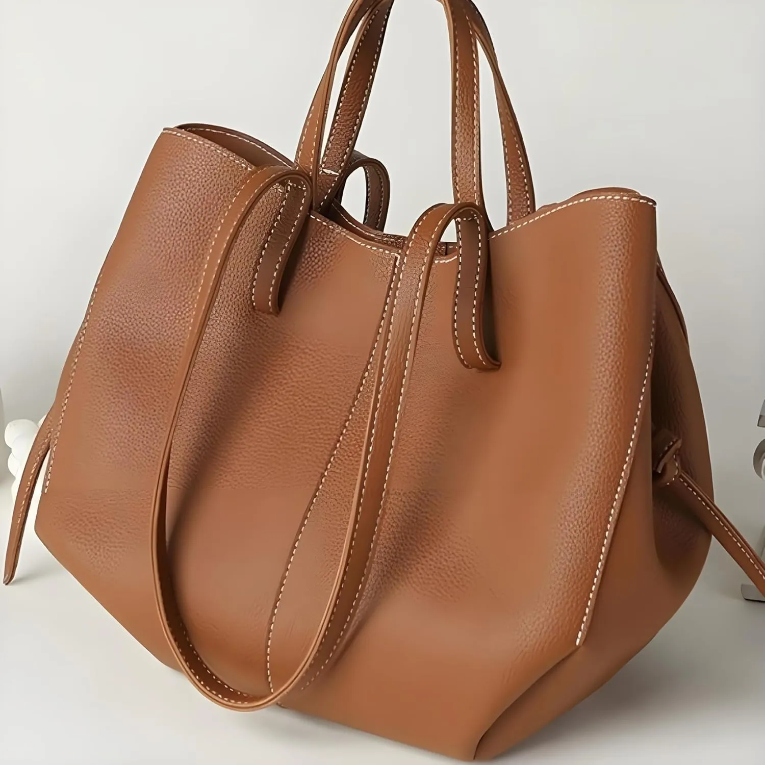 Comes with wallet and wing shaped tote bag, magnetic seal, synthetic leather, handheld and single shoulder (non adjustable)