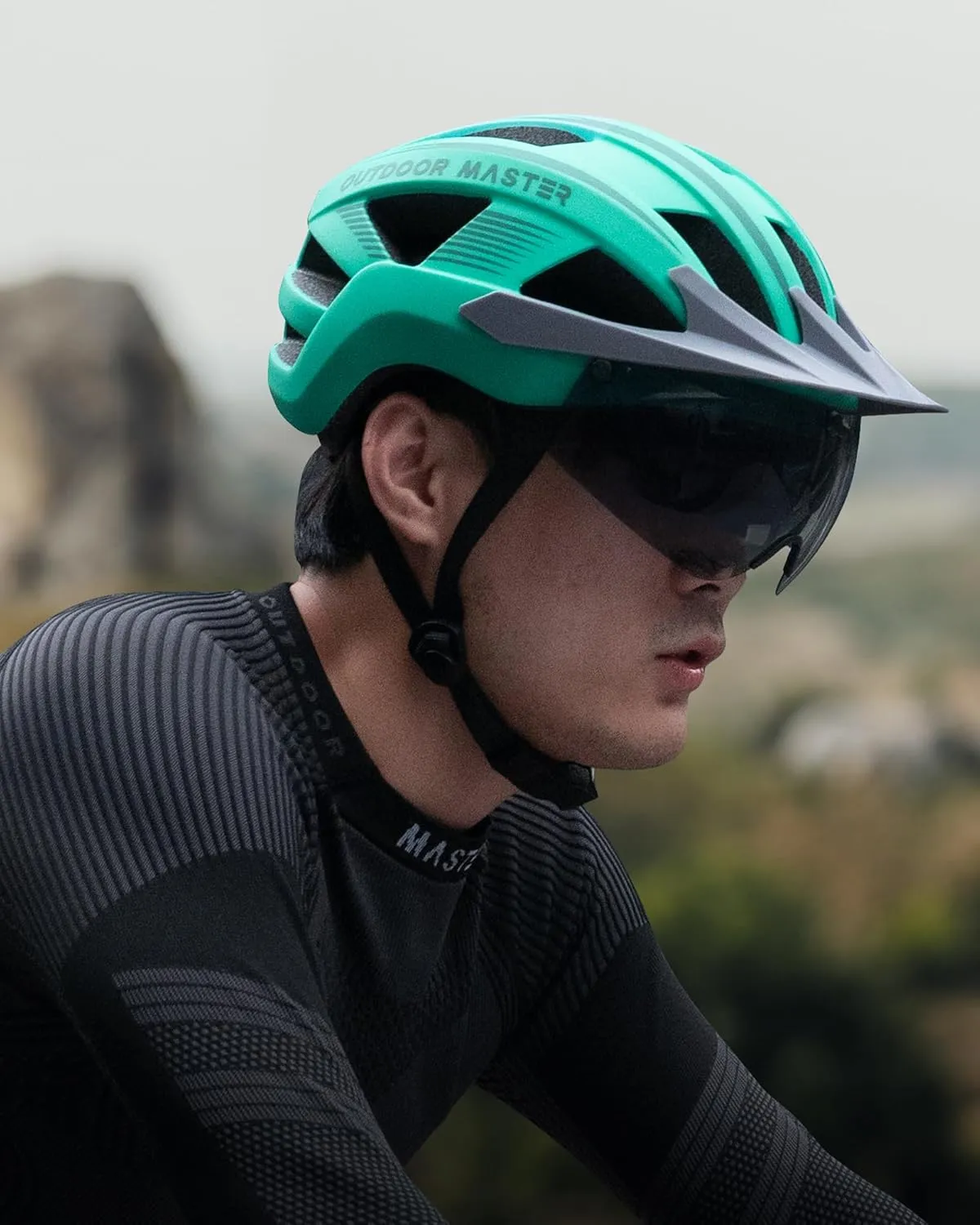 OutdoorMaster Adult Bike Helmet - Bicycle Helmet with Rechargeable Rear LED Light, Detachable Magnetic Goggles, Removable Sun Visor - Suitable for Commuting and Cycling for Men and Women